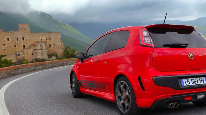 Back Side Pose Of 2010 Abarth Punto Evo In Red